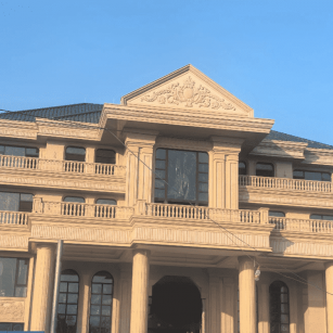 孝感黄金麻别墅外墙干挂石材效果示例