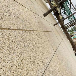 孝感 黄金麻花岗岩荔枝面外墙干挂石材效果示例