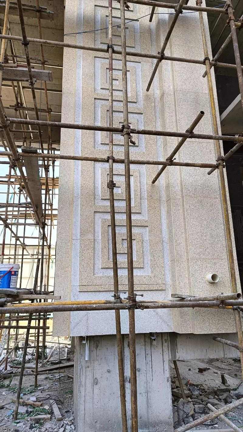 孝感 黄金麻花岗岩别墅外墙干挂回纹造型效果