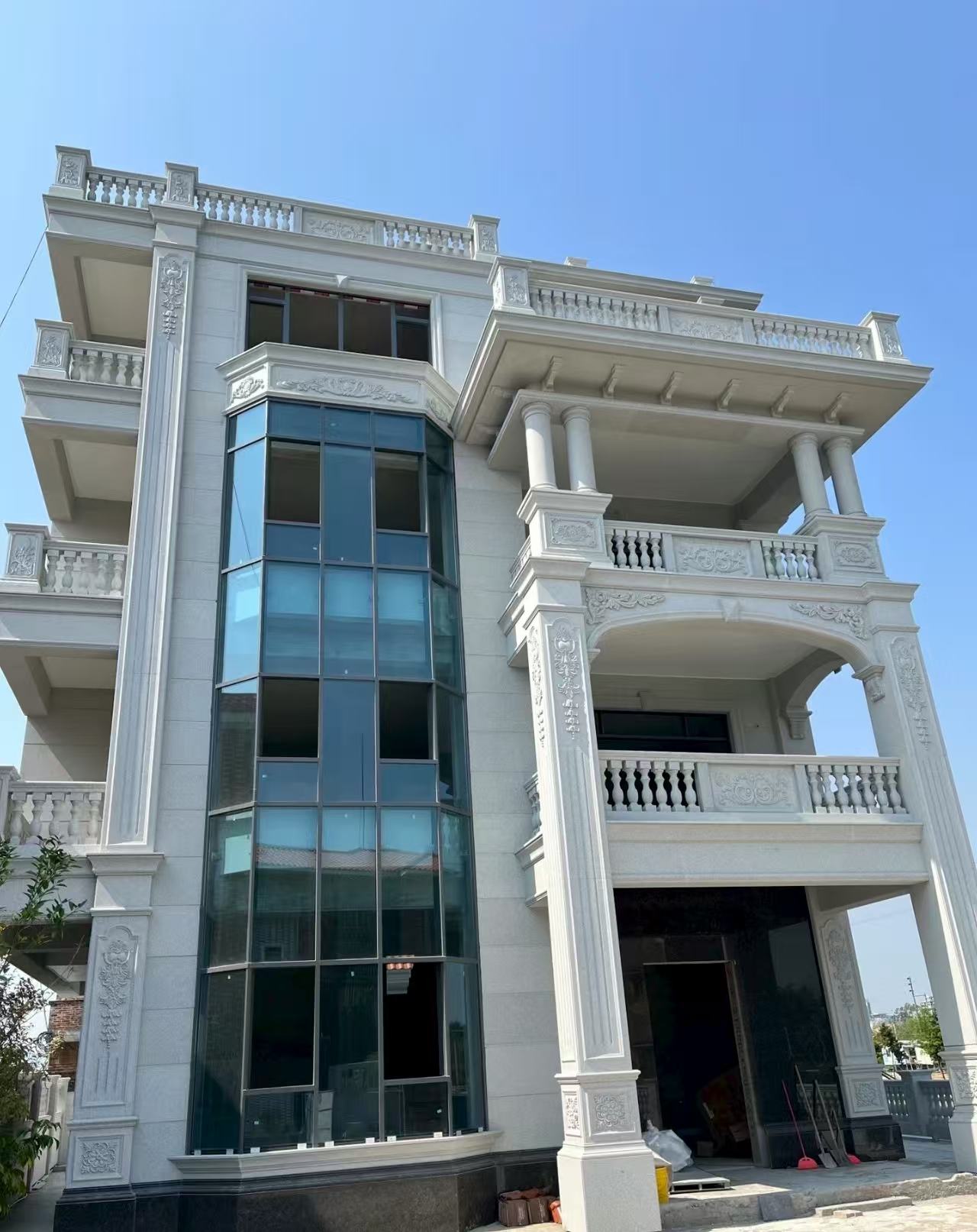 孝感 白麻花岗岩别墅外墙干挂效果展示