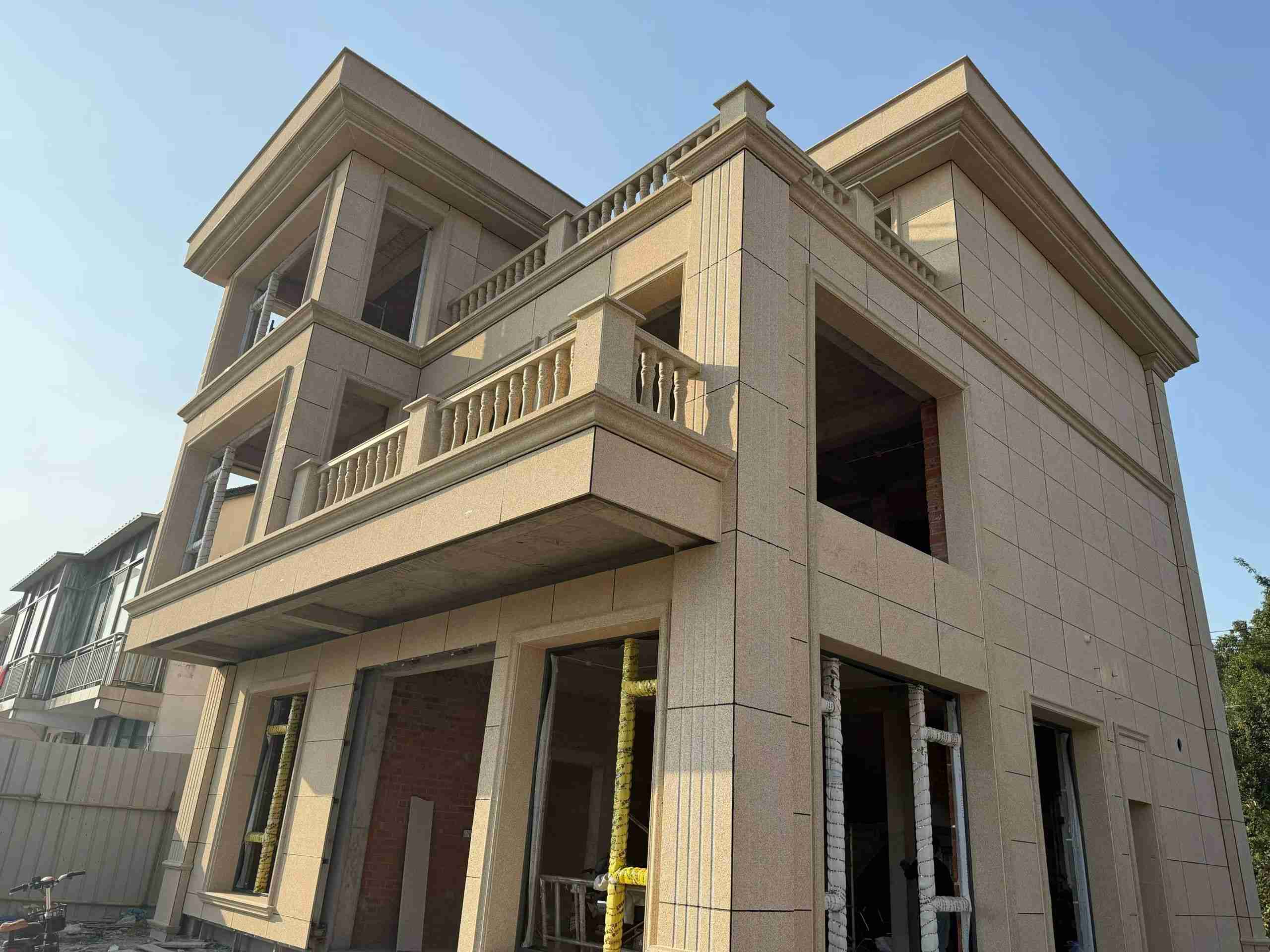 孝感 黄金麻花岗岩石材荔枝面外墙干挂效果展示